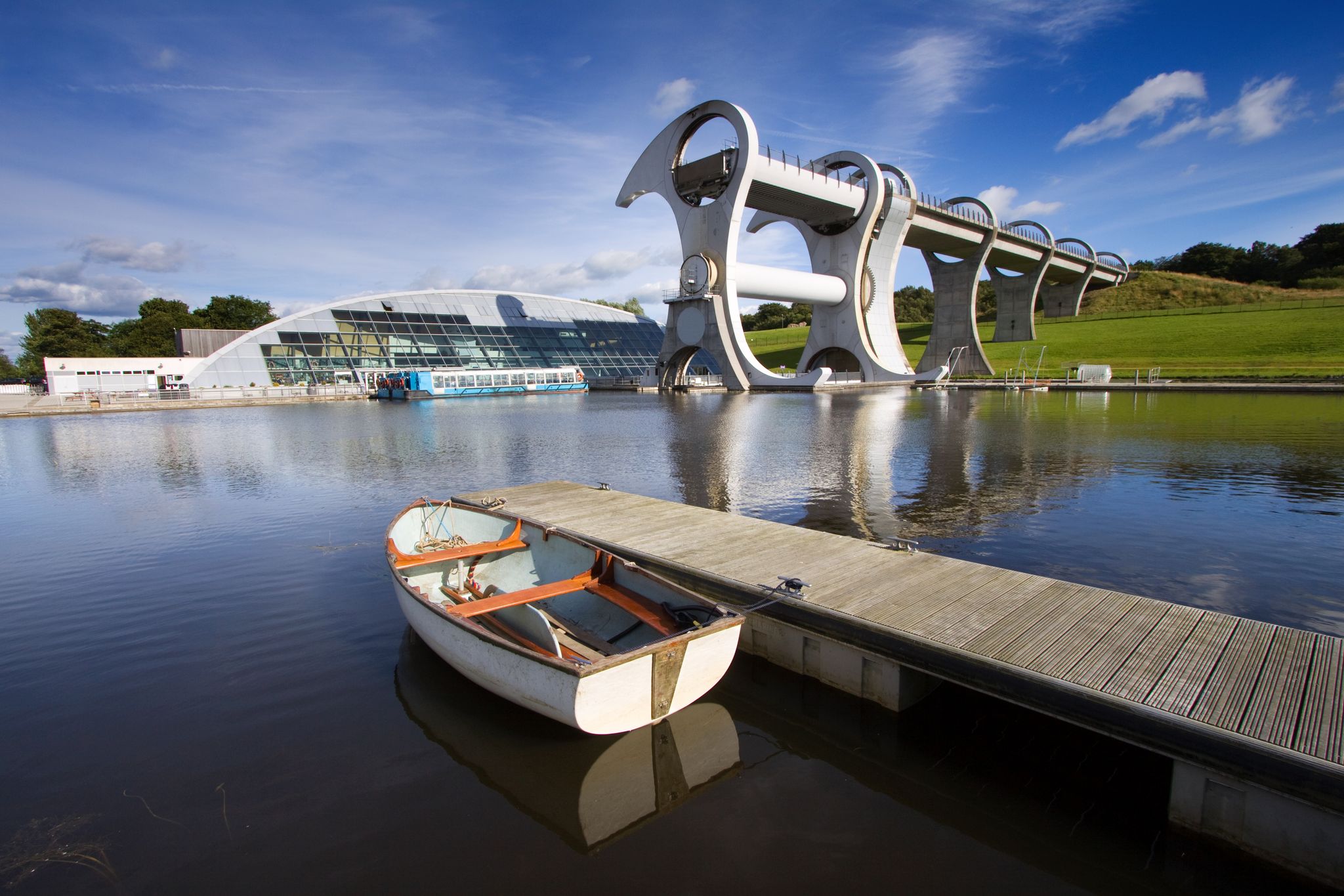The Falkirk Wheel, a rotating boat lift linking the Forth and Clyde Canals with the Union Canal in Central Scotland. Opened in 2002, this engineering landmark is the only one of its kind in the world.