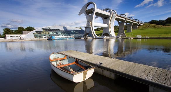 The Falkirk Wheel, a rotating boat lift linking the Forth and Clyde Canals with the Union Canal in Central Scotland. Opened in 2002, this engineering landmark is the only one of its kind in the world.