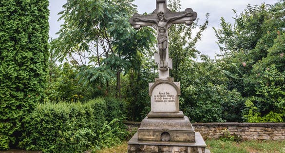 Photo of Cross next to so called Candle Monument in Soroca town, Moldova.
