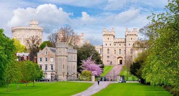 Photo of long walk to Windsor Castle that was built in the 11th Century and is the residence of the British Royal Family, UK.