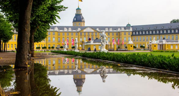photo of view of Castle of a lord named Karl Friedrich Schloss Karlsruhe in Karlsruhe, Germany in the state Baden-Württemberg. It was build around 300 years ago and it one of the most famous buildings within the city
