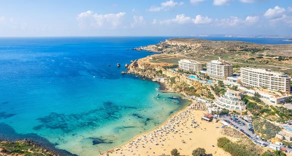Photo of aerial view of beautiful landscape with Golden bay beach, Malta.