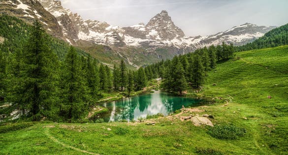 The scenic Blue Lake (Lago Blu) surrounded by a beautiful alpine landscape near Cervinia, Aosta Valley, Italy
