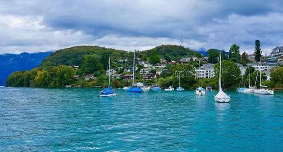Photo of beautiful Spiez harbor at Lake Thun Switzerland.