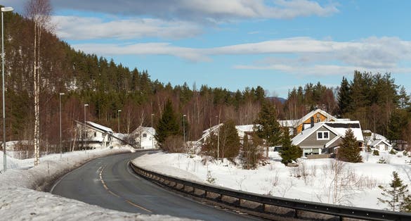 Photo of abstract landscape in the mountains, with reflection of the forest in the river at Kongsberg, Norway.