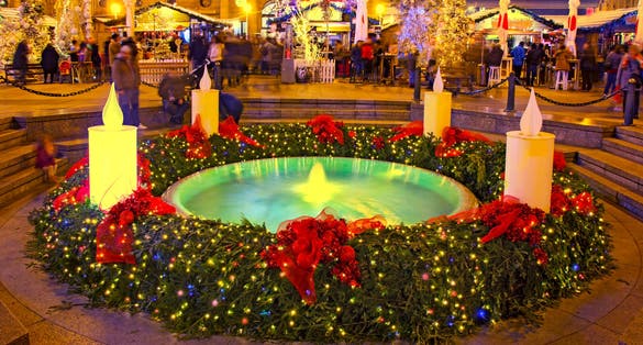 Photo of Mandusevac fountain on Ban Jelacic square decorated with advent wreath as part of "Advent in Zagreb" , Croatia.