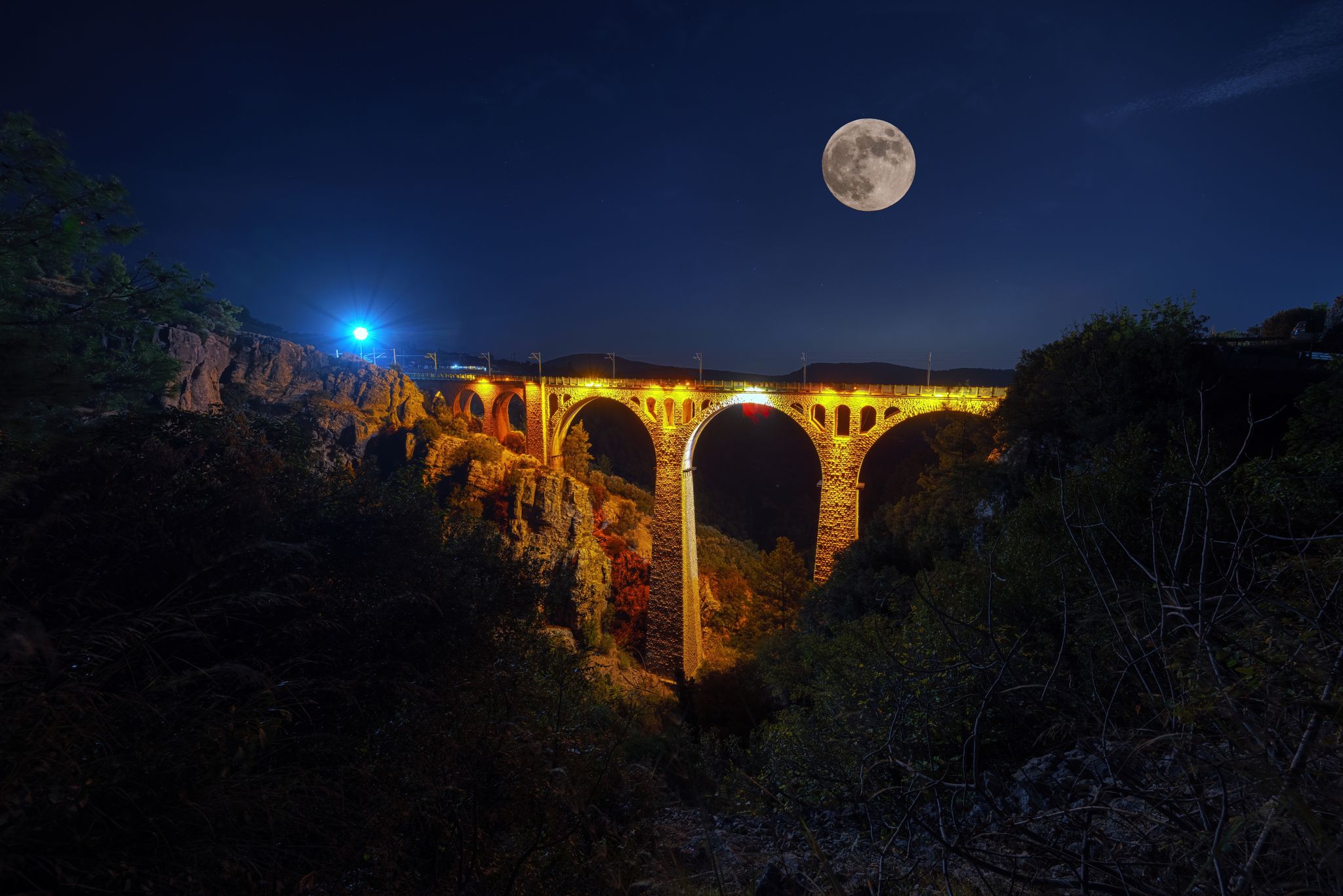 photo of Varda bridge on full moon night in Adana, Turkey.