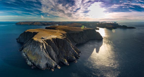 Photo of aerial view of Nordkapp (North Cape) in the extreme part of Norway over the blue sea.