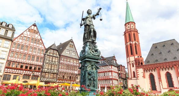 Photo of old town square romerberg with Justitia statue in Frankfurt ,Germany.