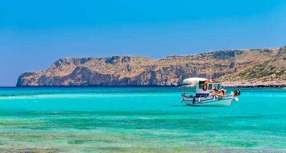 photo of view of Fishing boat near Balos beach. Crete, Greece.