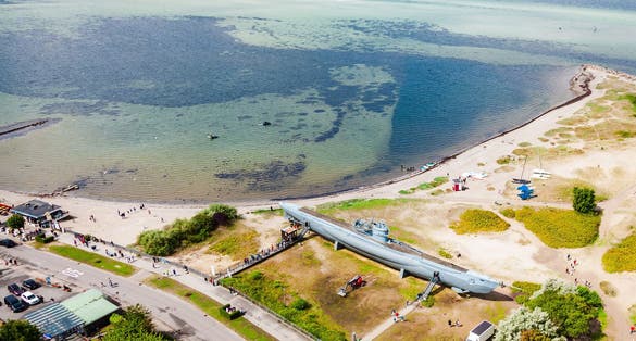 U-Boat U995 at the beach, on the coast in Laboe. German submarine U-995. Aerial view