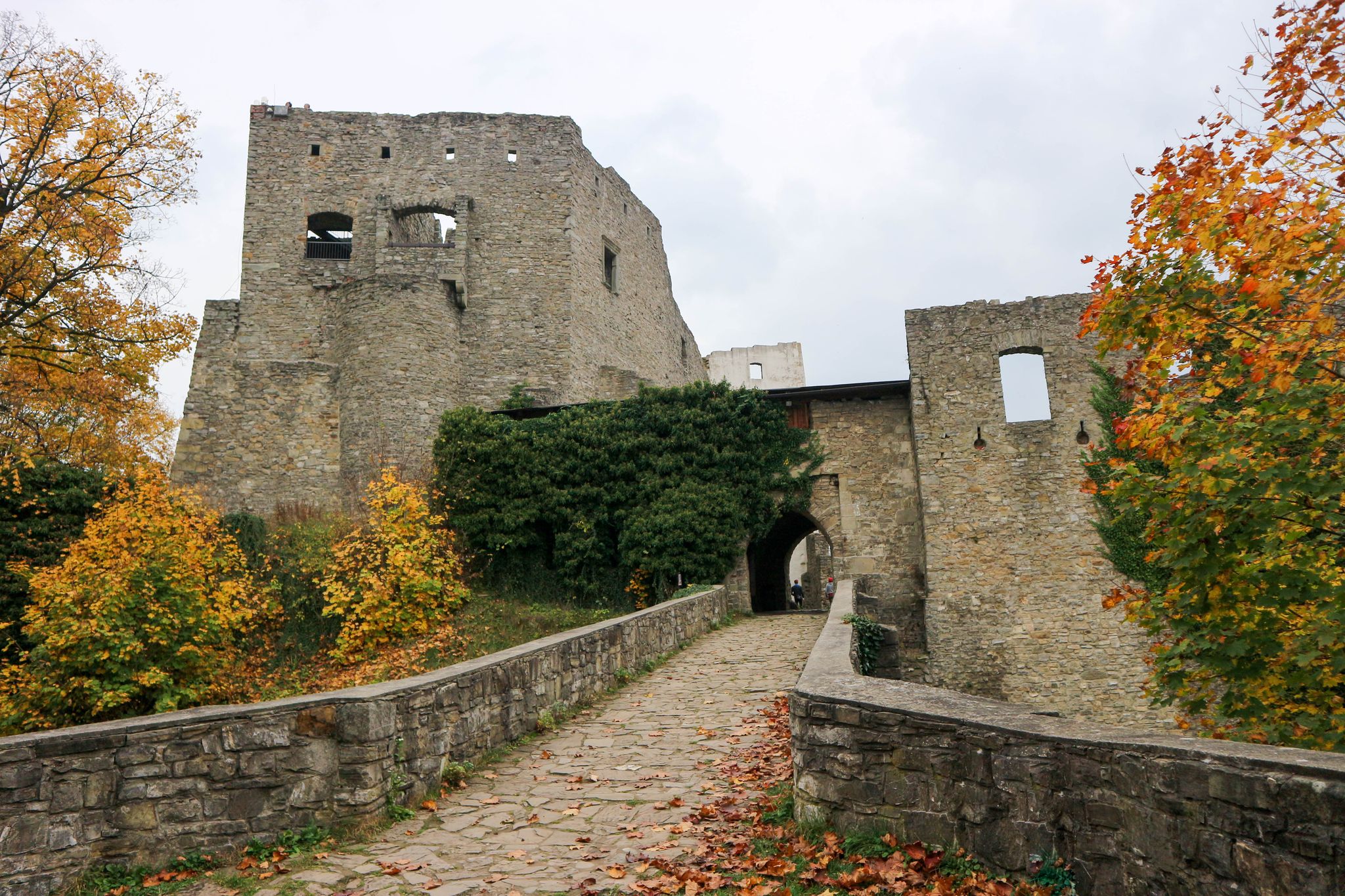 Photo of beautiful autumn view of the main gate of medieval castle Hukvaldy, Czech republic.