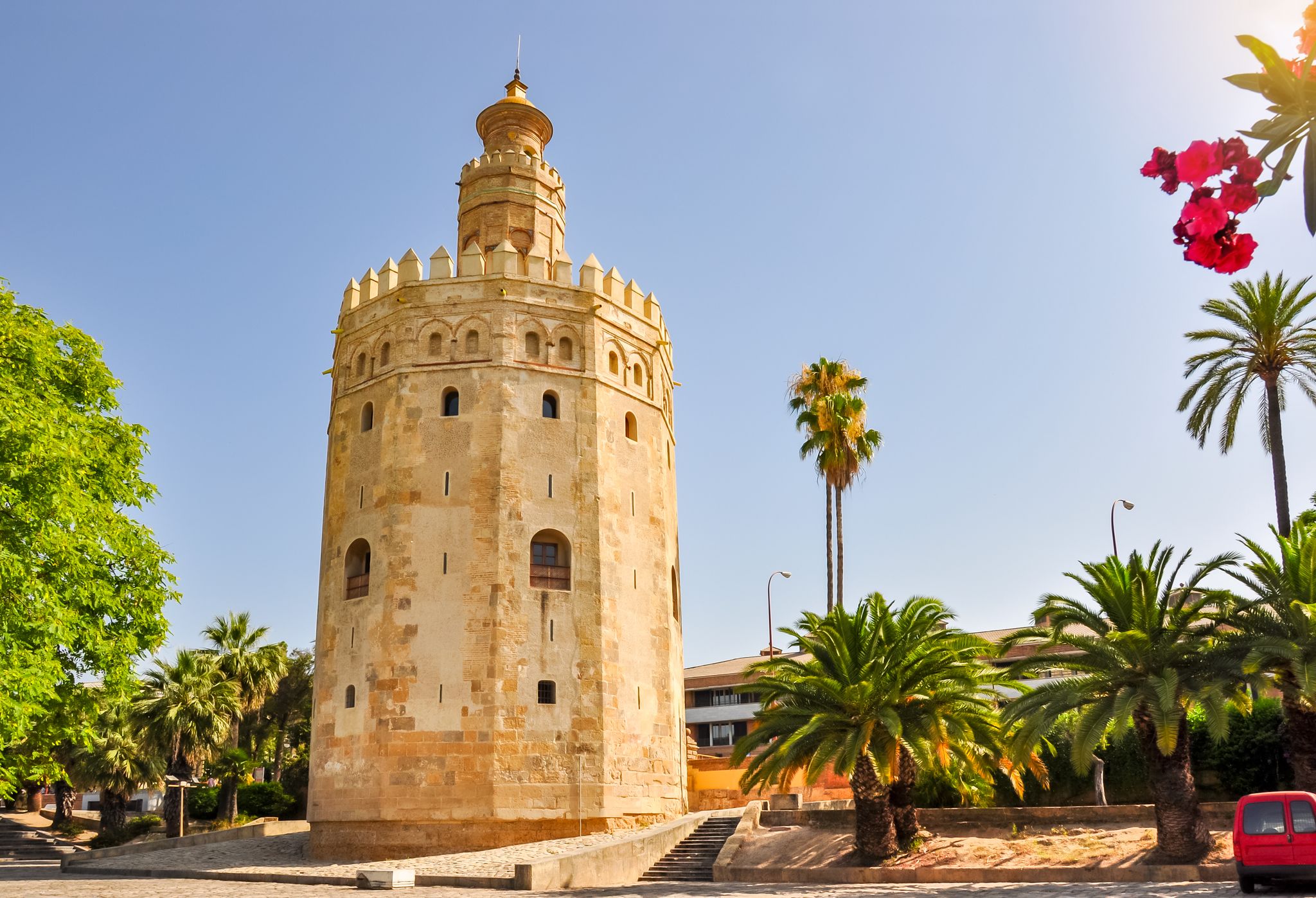 Photo of Tower of Gold (Torre del Oro) on Guadalquivir river embankment, Spain .
