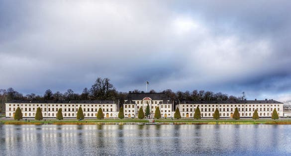 photo of cloudy morning view of Karlberg Palace in Solna, Sweden.
