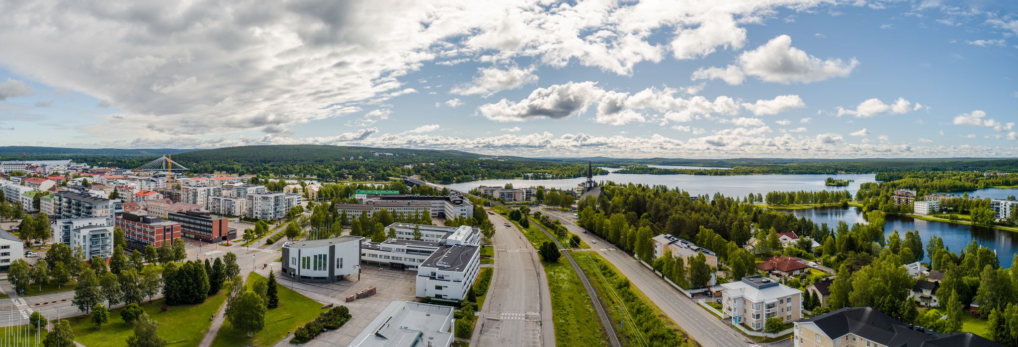 Rovaniemi Finland, panorama of the city with Kemijoki river in the back and Ounasvaara fell with the city heart at the left.