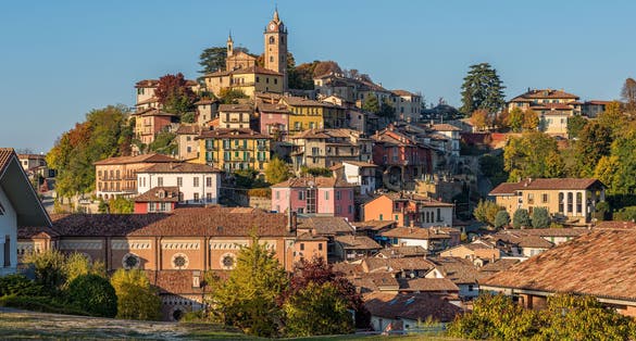 photo of Panoramic sight of Monforte d'Alba village during fall season. Langhe region of Piedmont, Cuneo, Italy.