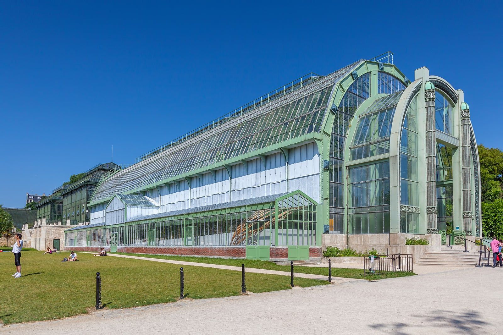 photo of Art Deco entrance of the greenhouse in Jardin des plantes in Paris, France.