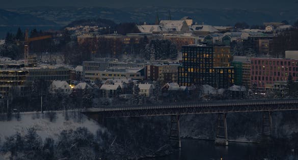 Winter in Trondheim big orange moon, dark winter