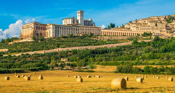 Photo of Panoramic view of the Saint Francis Basilica in Assisi, in the Province of Perugia, in the Umbria region of Italy.