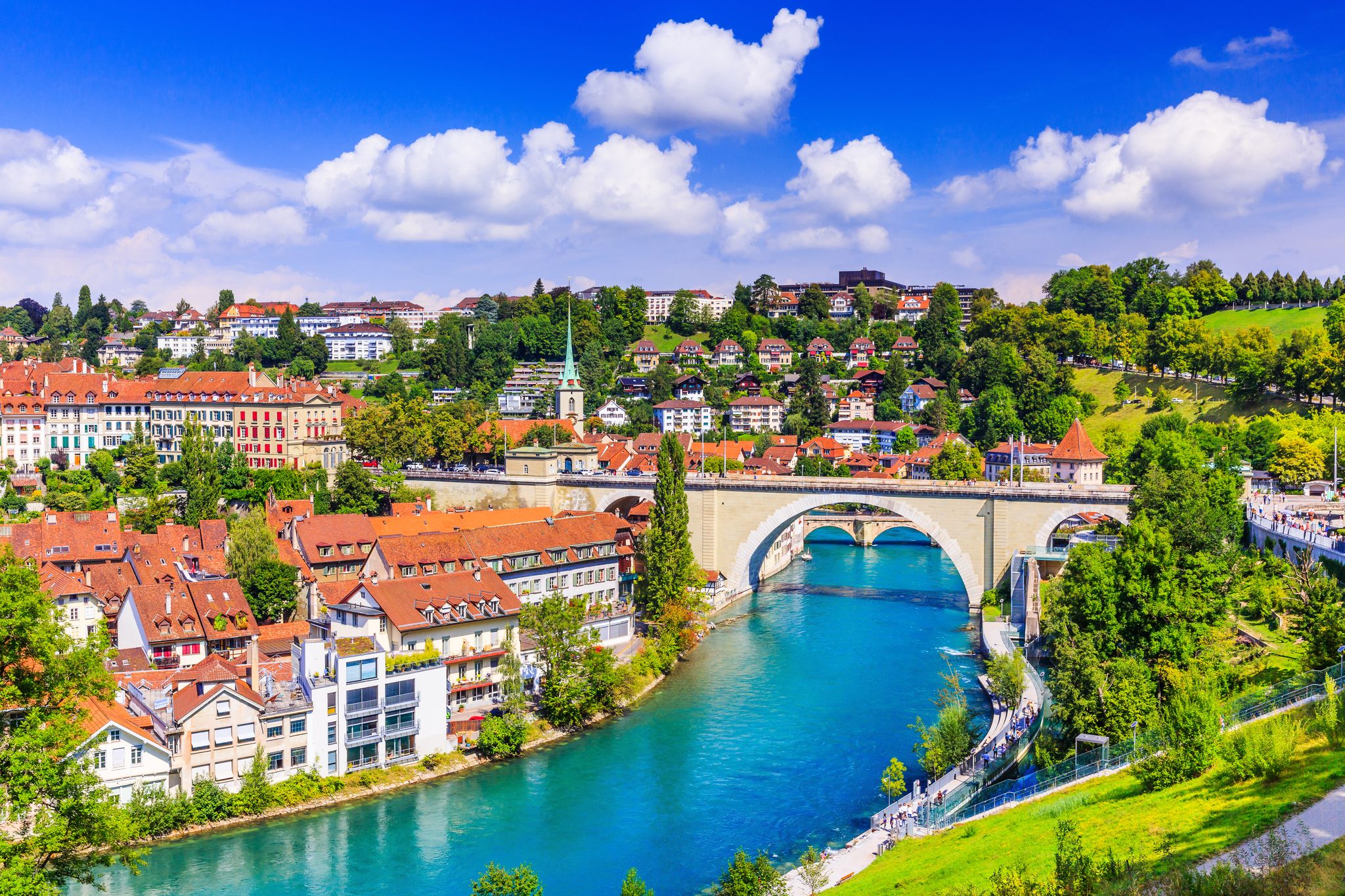 Panoramic view of historic Zurich city center with famous Fraumunster, Grossmunster and St. Peter and river Limmat at Lake Zurich on a sunny day with clouds in summer, Canton of Zurich, Switzerland