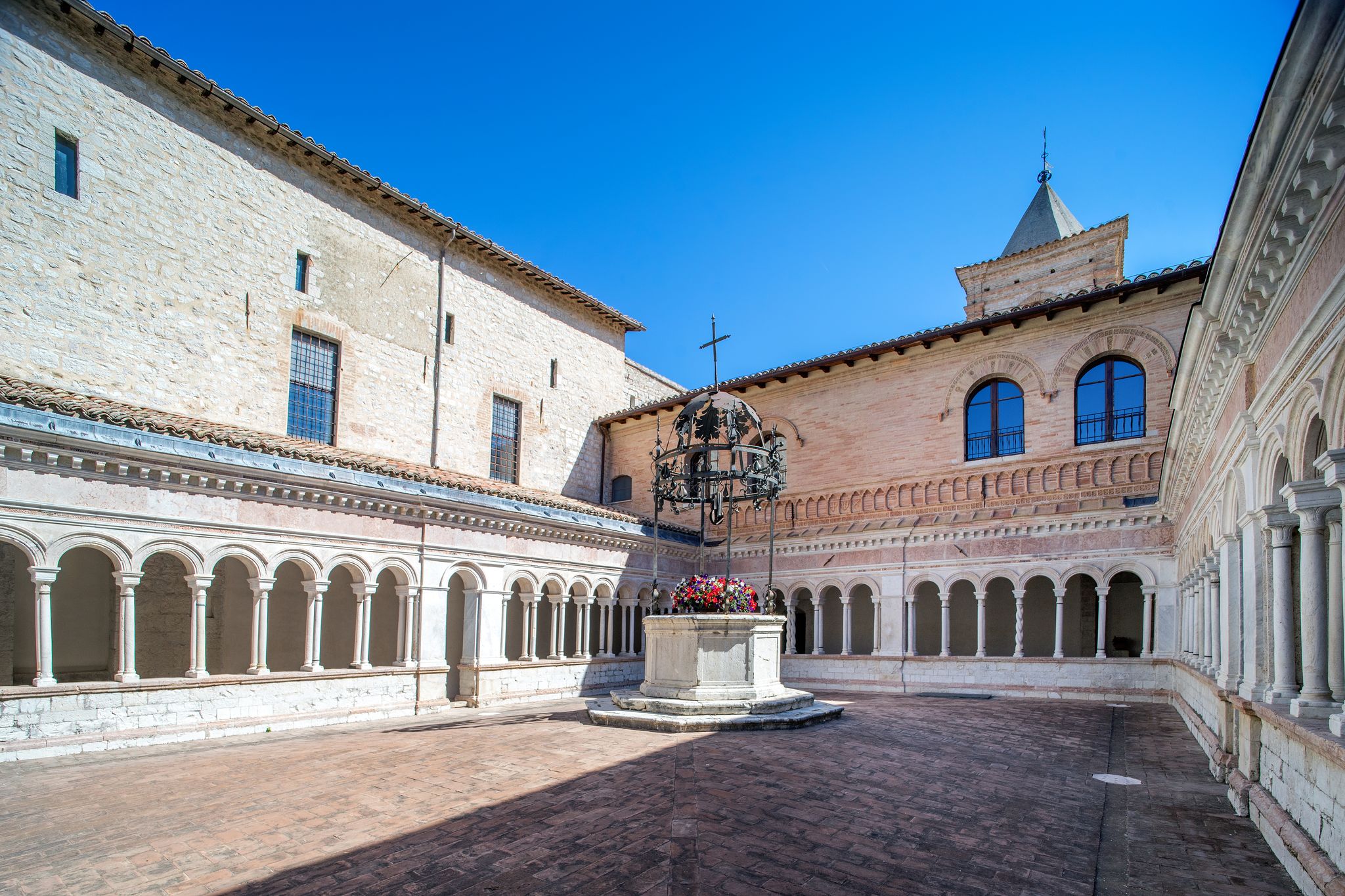 Photo of the Romanesque cloister of the abbey of Sassovivo of the thirteenth century, Foligno, Umbria, work of Vassalletto, Italy.