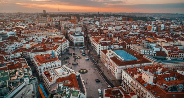 Photo of Madrid Puerta del Sol aerial view with historical buildings in Spain.