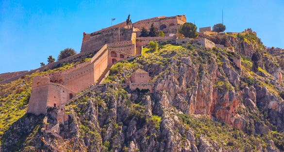 Photo of Palamidi fortress castle on hill top in Nafplio or Nafplion, Peloponnese, Greece