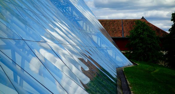 photo of view of Glass house above cathedral to protect it in Hamar in Norway.