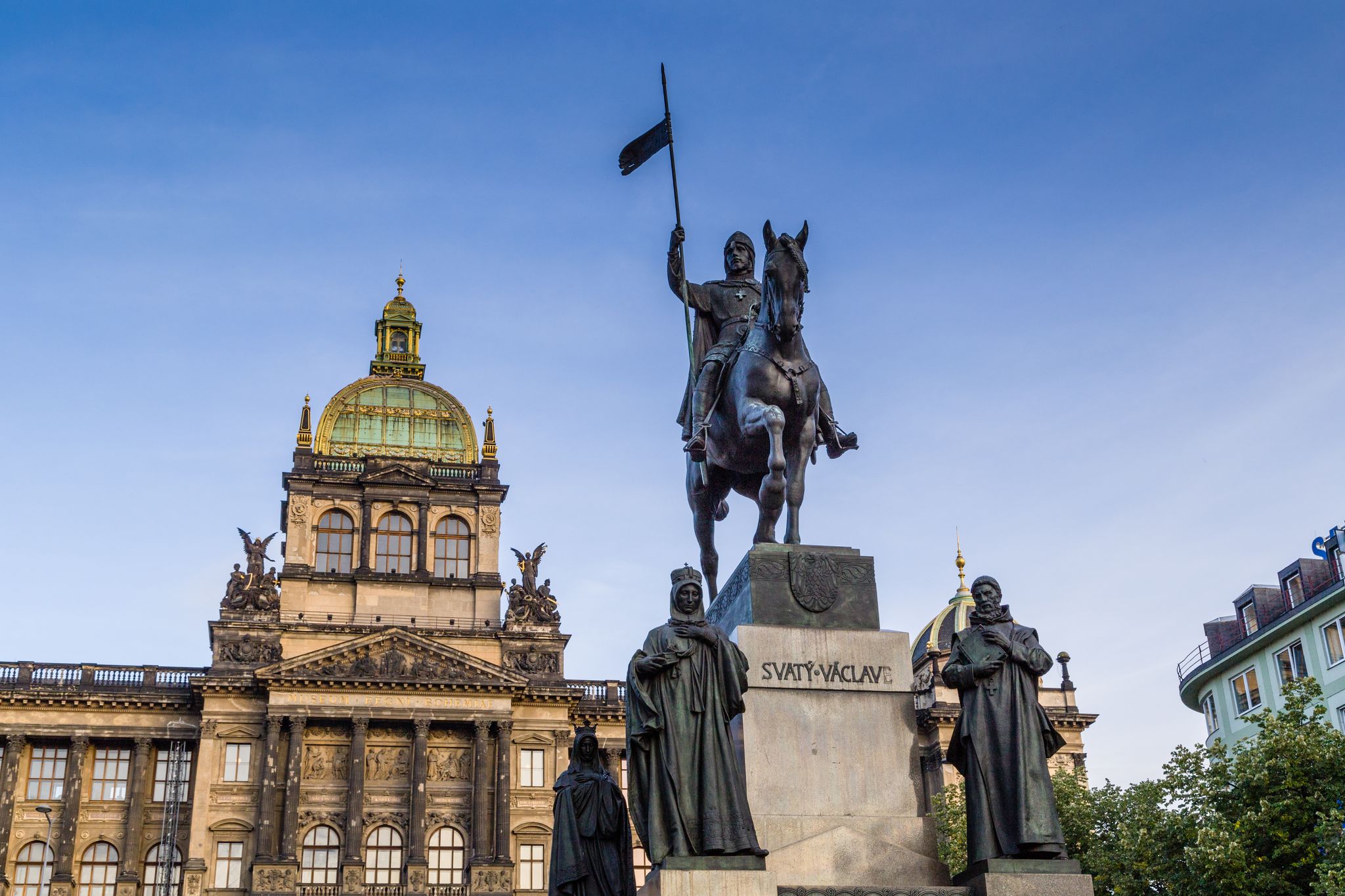 Photo of equestrian statue of Saint Wenceslas and the Neorenaissance National Museum, Czech Republic.