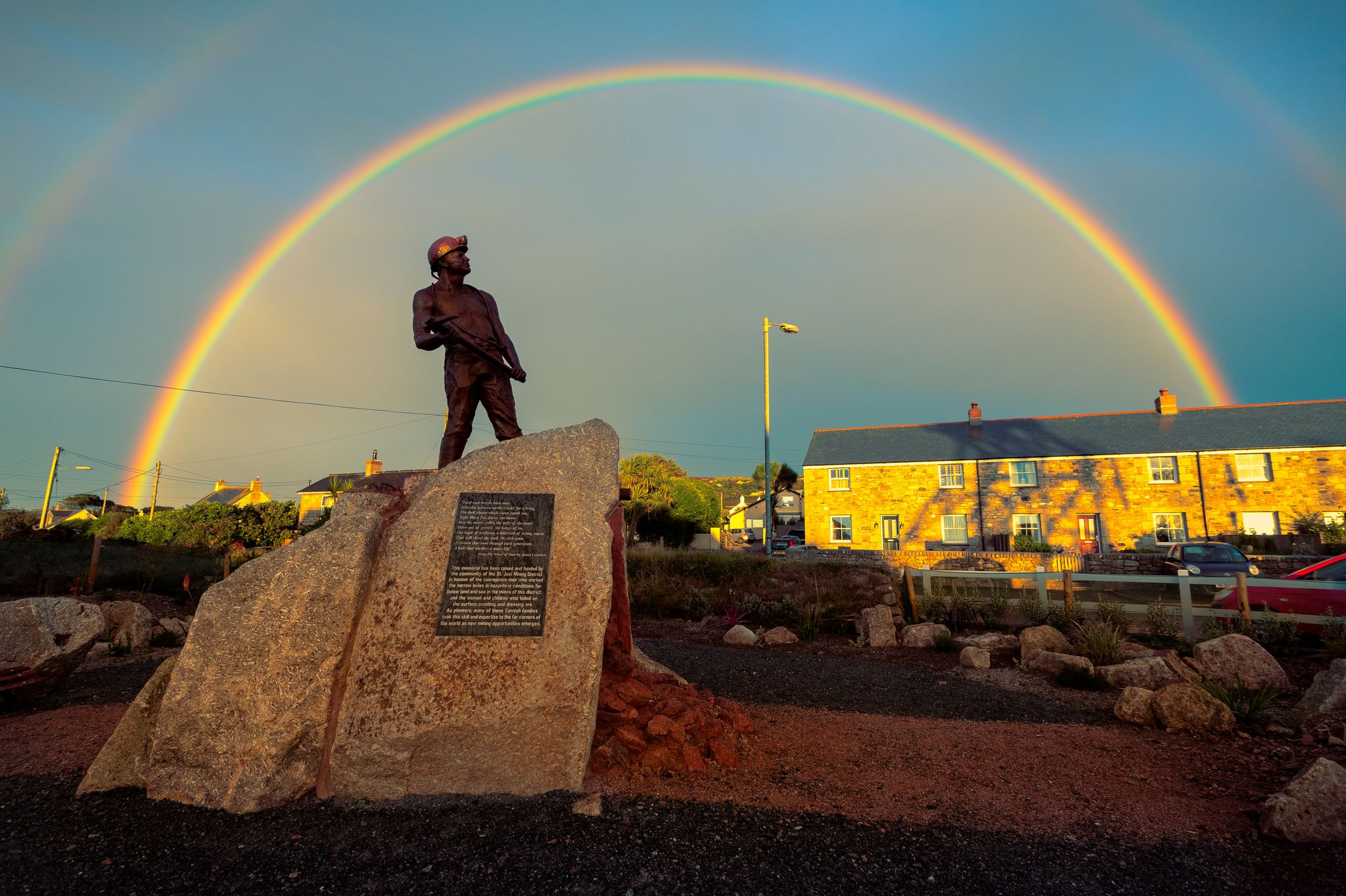 Photo of Tin miner statue at Geevor Tin Mine in Cornwall, England.