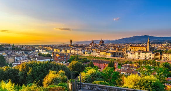 Photo of Sunset view of Florence, Ponte Vecchio, Palazzo Vecchio and Florence Duomo, Italy. Architecture and landmark of Florence. Cityscape of Florence.