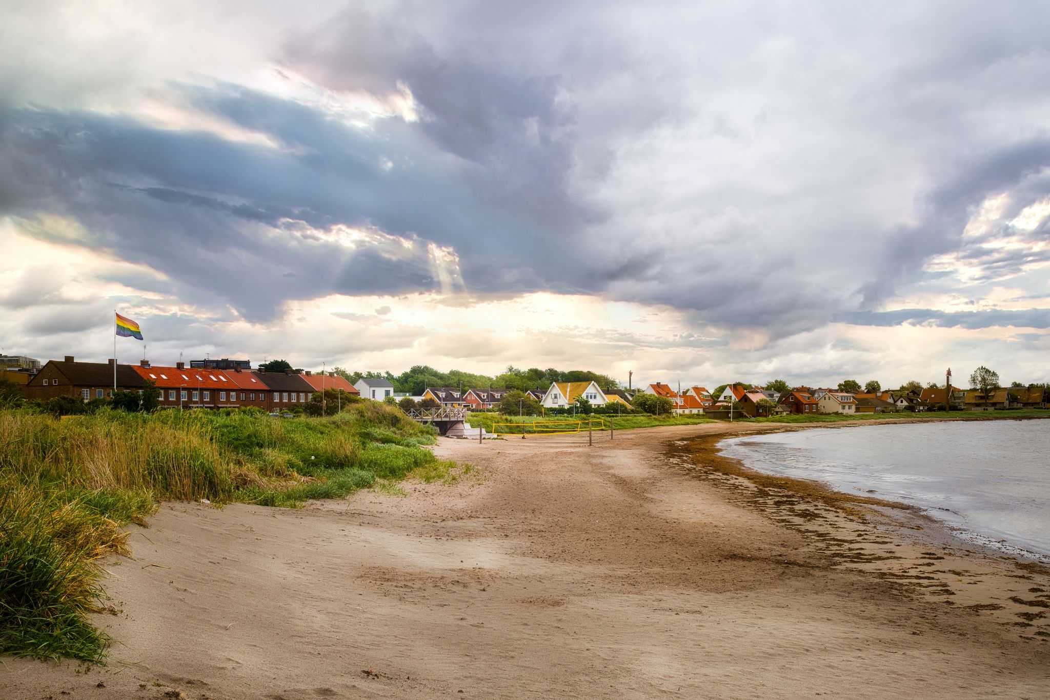 photo of view of View over the popular city beach Kvickbadet in Hoganas, Skane, Sweden. Selective focus.