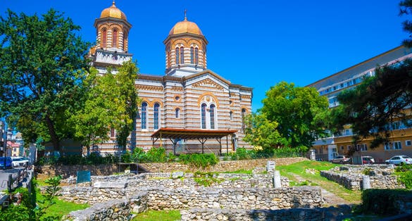Walls of the ancient citadel ruins of Histria near Saint Andrei christian church of Constanta in Romania.
