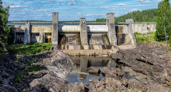 Photo of the dry stream bed of the hydroelectric power station dam in Imatra - Imatrankoski, Finland.
