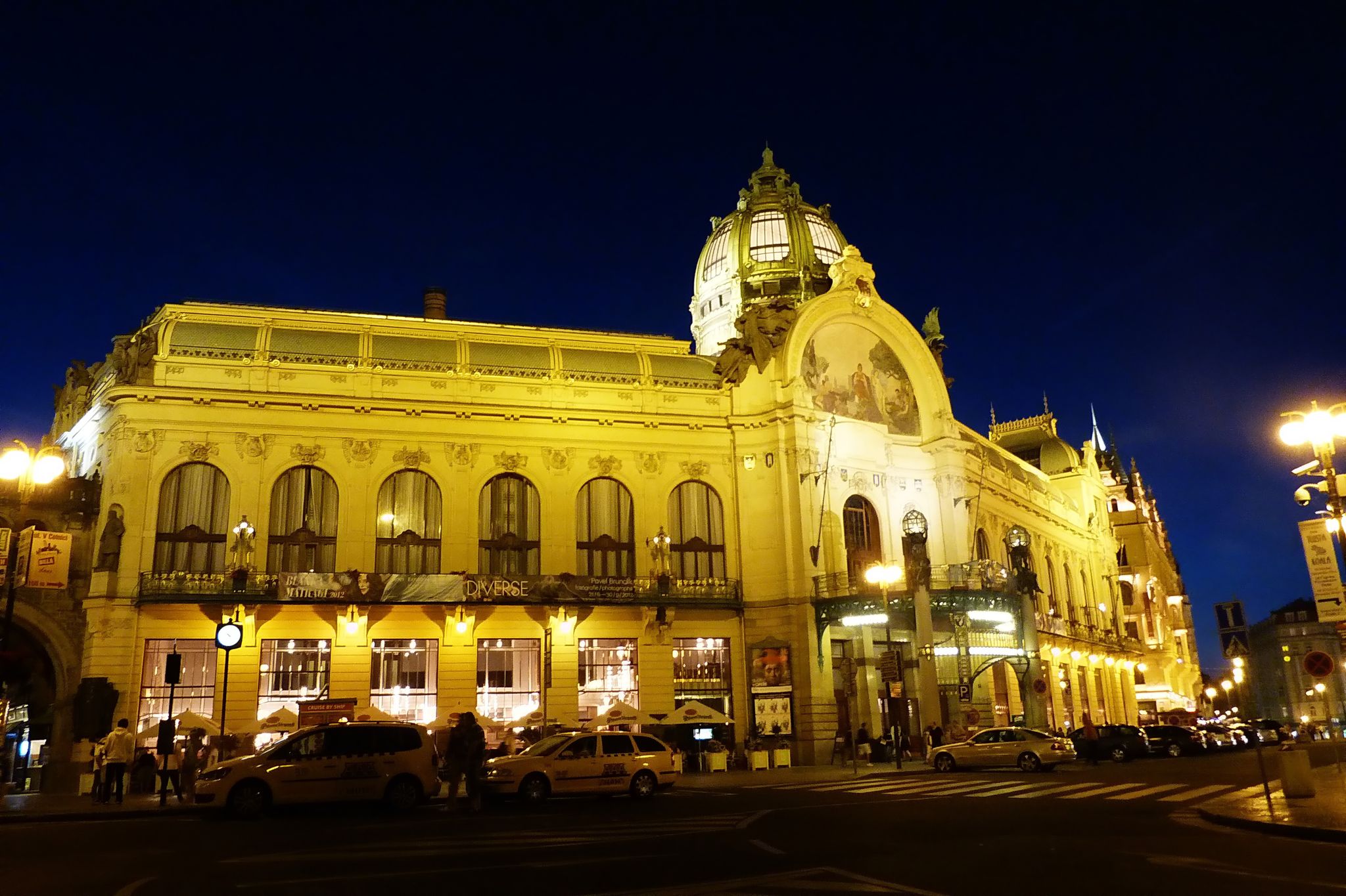 Photo of Municipal House facade at night, Prague, Czech Republic.