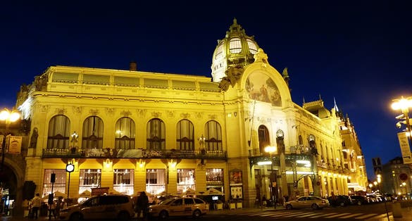 Photo of Municipal House facade at night, Prague, Czech Republic.