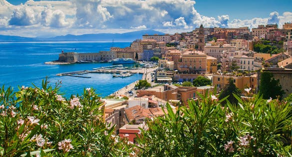 Photo of coastal landscape with old town of Gaeta with it's beautiful beach and blue beach, Italy.