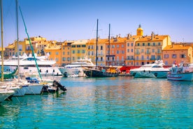 Photo of beautiful aerial view of Saint-Tropez, France with seascape and blue sky.