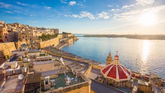 Aerial view of Lady of Mount Carmel church, St.Paul's Cathedral in Valletta embankment city center, Malta.