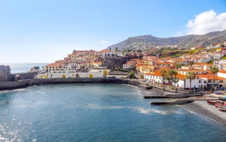 Aerial drone view of Camara de Lobos village, Madeira.