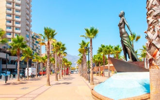 Photo of aerial panoramic view of Fuengirola city beach and marina, Fuengirola is a city on the Costa del Sol in the province of Malaga in the Andalusia, Spain.