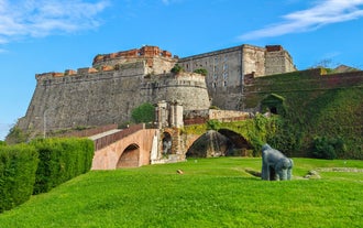 Photo of beautiful street and traditional buildings of Savona, Liguria, Italy.
