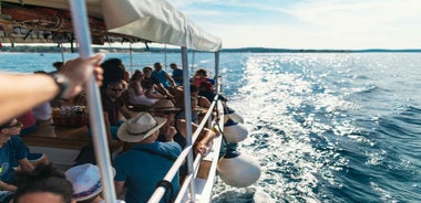 Rovinj: Sunset Cruise with Swim Stop, Drinks, and Fruits