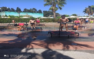 Photo of aerial view of Kuşadası beach resort town on Turkey’s western Aegean coast.