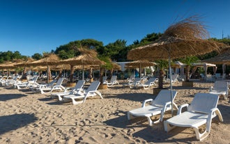 Photo of aerial view of The Cathedral of the Assumption and Varna city at amazing sunset, Bulgaria.