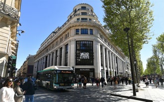 Paris, France. Panoramic view from Arc de Triomphe. Eiffel Tower and Avenue des Champs Elysees. Europe.