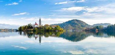 From Ljubljana: Lake Bled & Postojna Cave with Entry Tickets