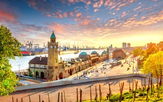 Photo of beautiful panoramic view of historic Bremen Market Square in the center of the Hanseatic City of Bremen with The Schuetting and famous Raths buildings on a sunny day with blue sky in summer, Germany.