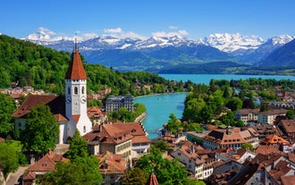 Bern, Switzerland. View of the old city center and Nydeggbrucke bridge over river Aare.