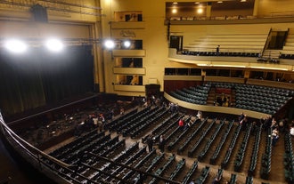 Porto, Portugal old town ribeira aerial promenade view with colorful houses, Douro river and boats.